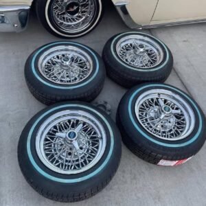 Original 14 inch standard truespokes with brand new Remington p175/70r14 white wall tires